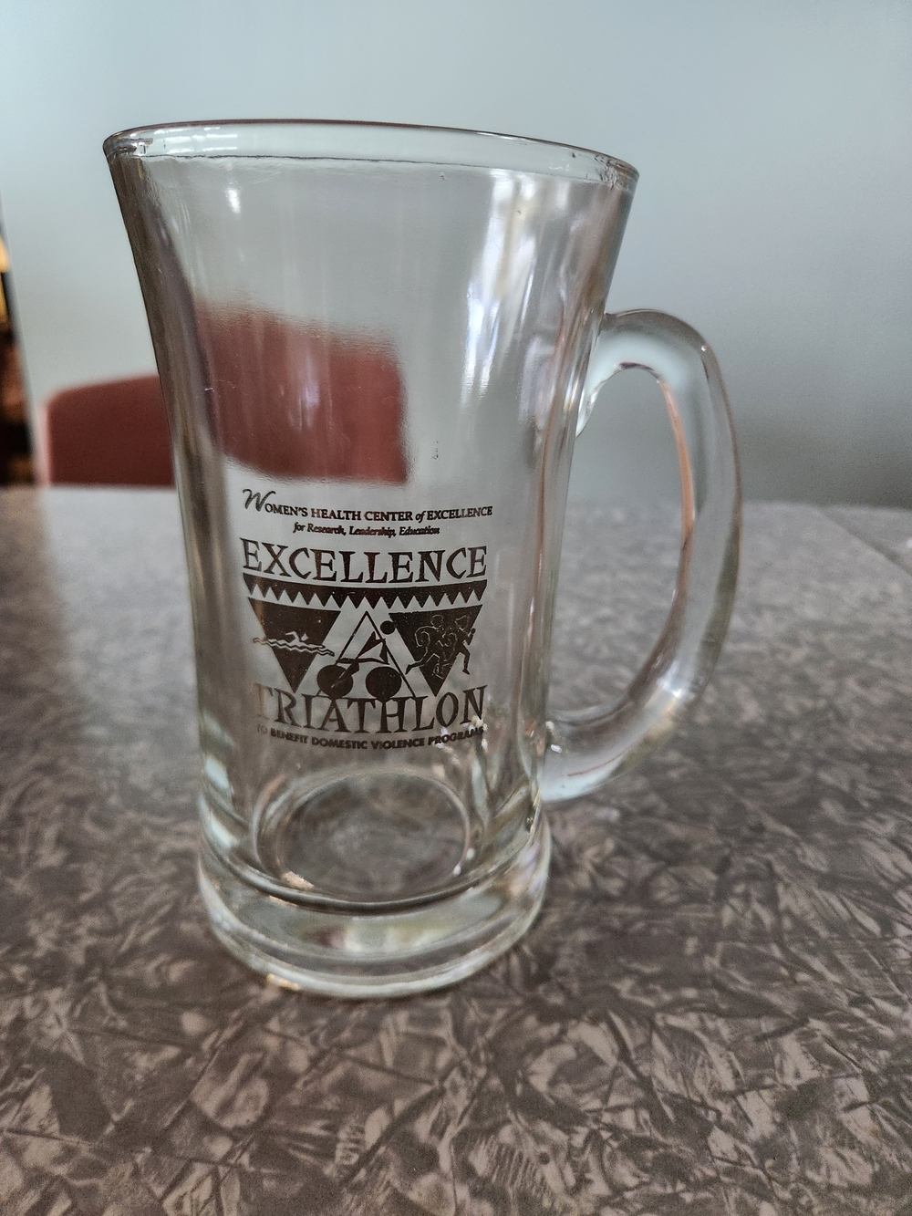 Source Unknown Clear Glass Mug with Black Excellence Triathlon Logo